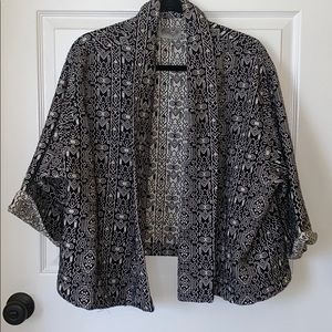 Printed jacket with elongated lapel